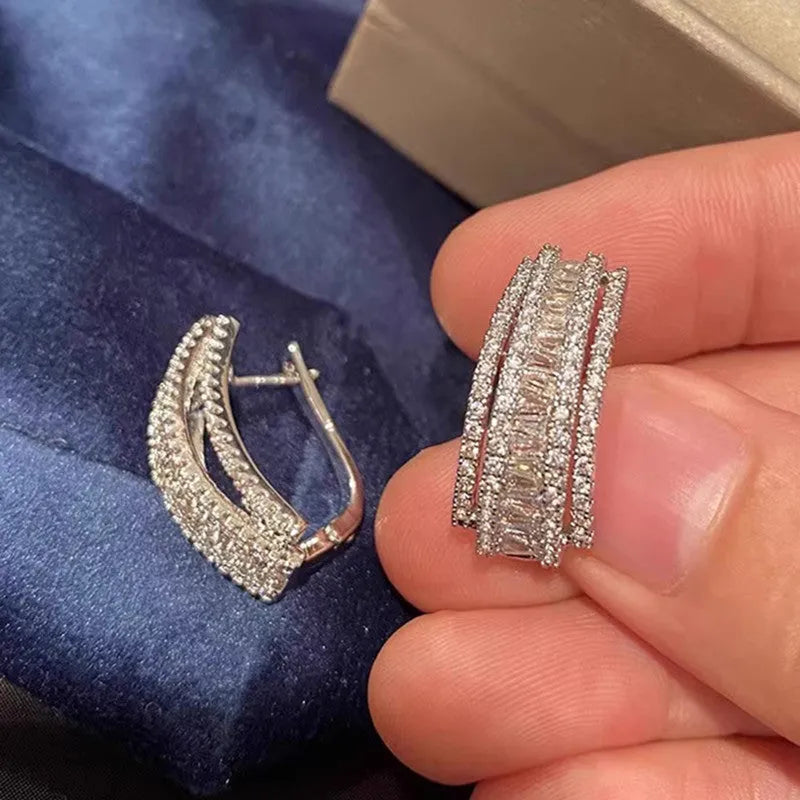 Geometric white gold colour stud earrings with zircon inlaid detailing for women