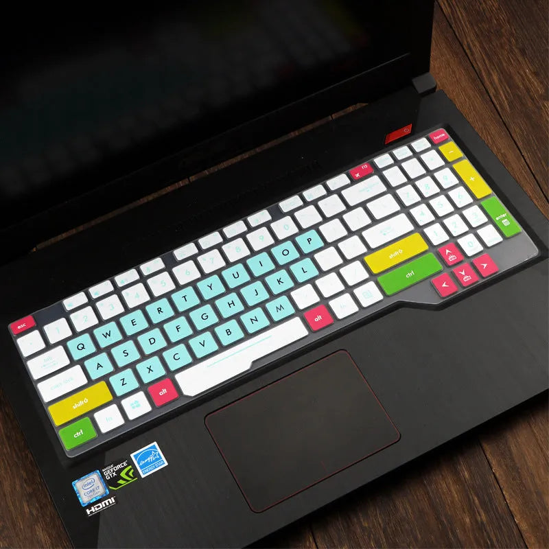 ASUS VivoBook 15 X513 laptop with a translucent mint coloured silicone keyboard protector fitted.