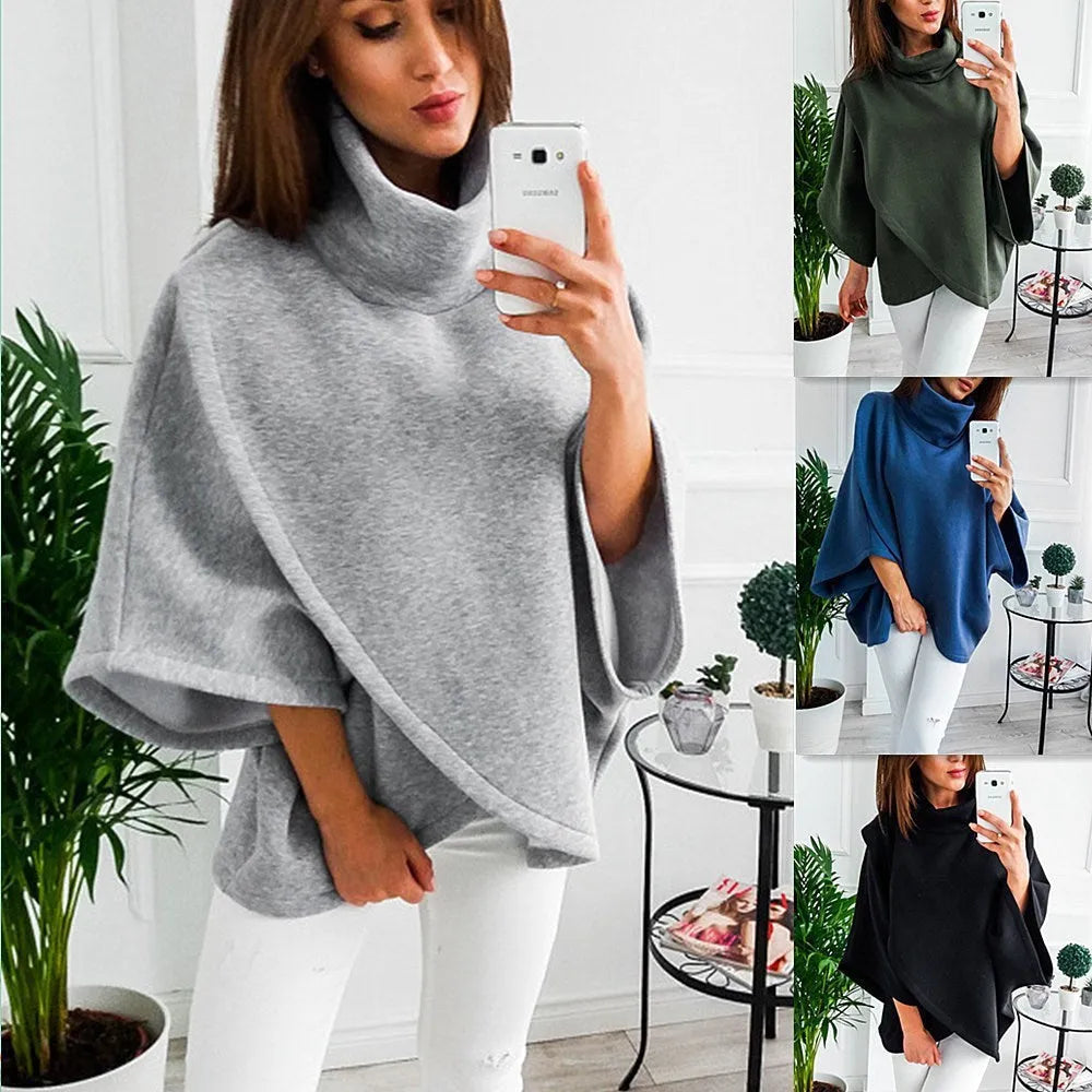 Women's long black batwing sleeve cardigan with plush fleece fabric on a hanger.