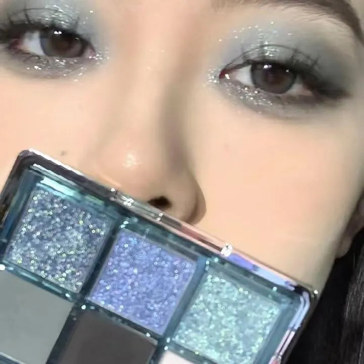 Mugeleen nine-colour eye shadow palette 08 with blue smoked design showing matte and shimmer finishes