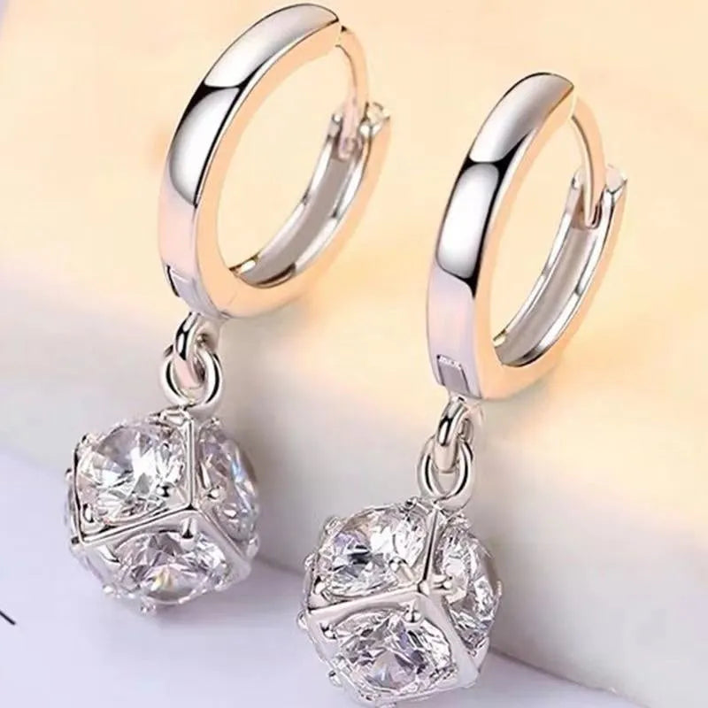 Women's geometric zircon earrings with rose decorative elements in multiple colour options