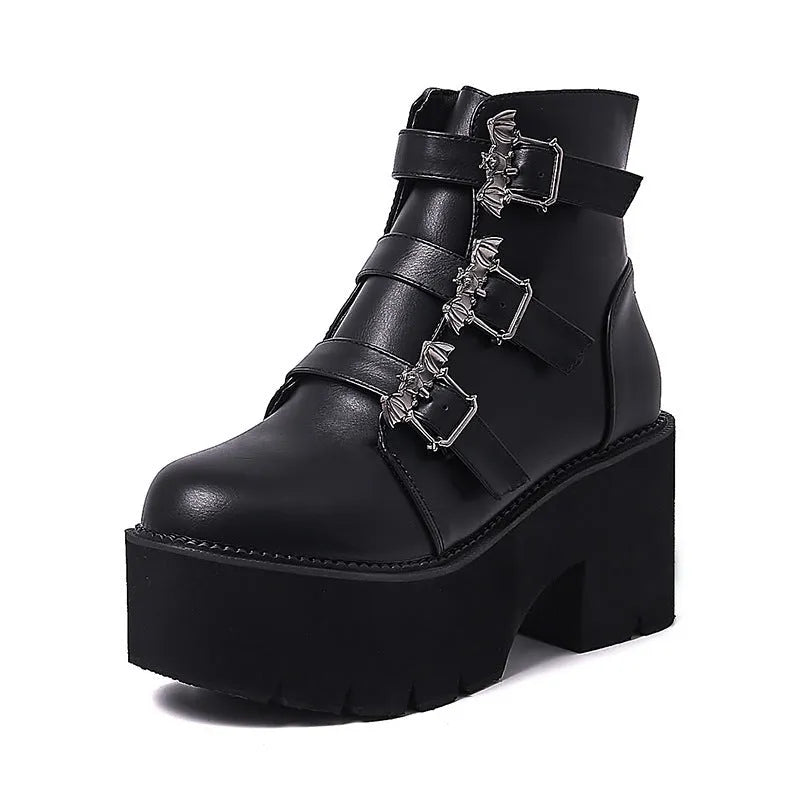 Black women's Harajuku punk ankle boots with bat buckle, thick heel, and side zip.