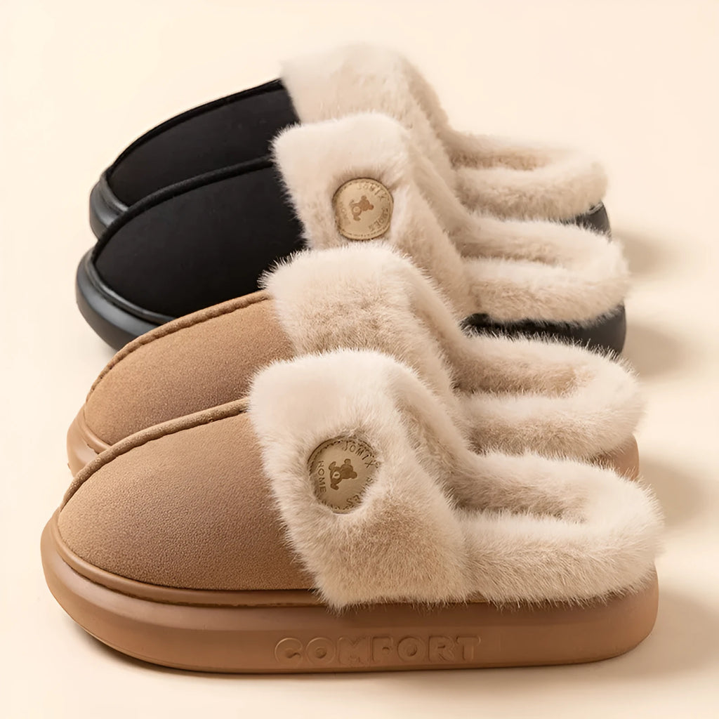 Pair of fleece slippers with a car stitch design and PVC sole, shown in one of five colour options.