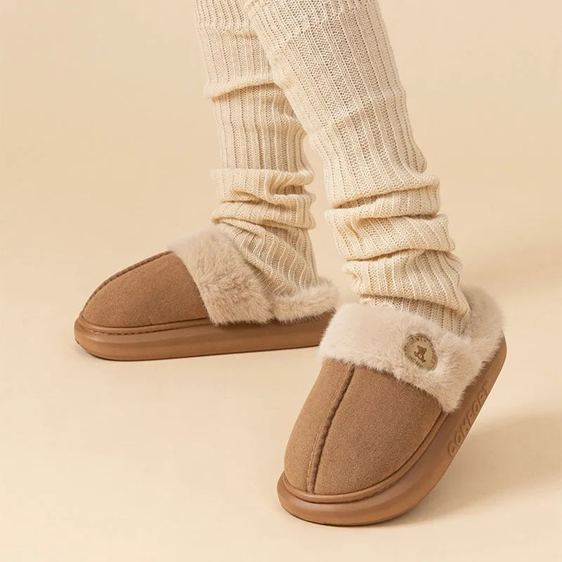 Pair of fleece slippers with a car stitch design and PVC sole, shown in one of five colour options.