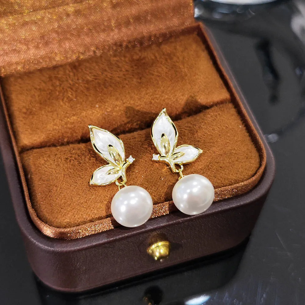 Women's butterfly earrings with zircon painting oil accents on copper with electroplating finish