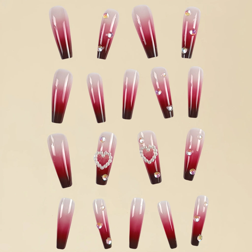 Wine red gradient plaid pattern fake nail tips with pearl heart detailing in ballet style