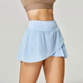 Women's solid colour quick-dry sports shorts with spandex lining for summer fitness activities