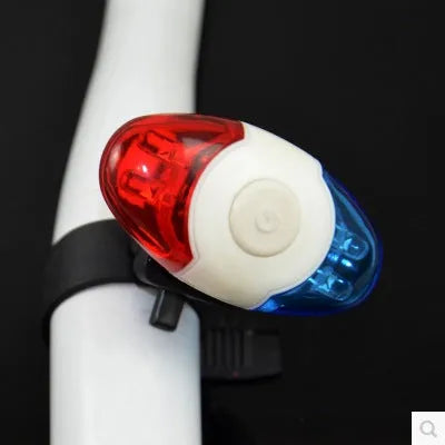 Red and blue LED bicycle tail light with adjustable mounting bracket.