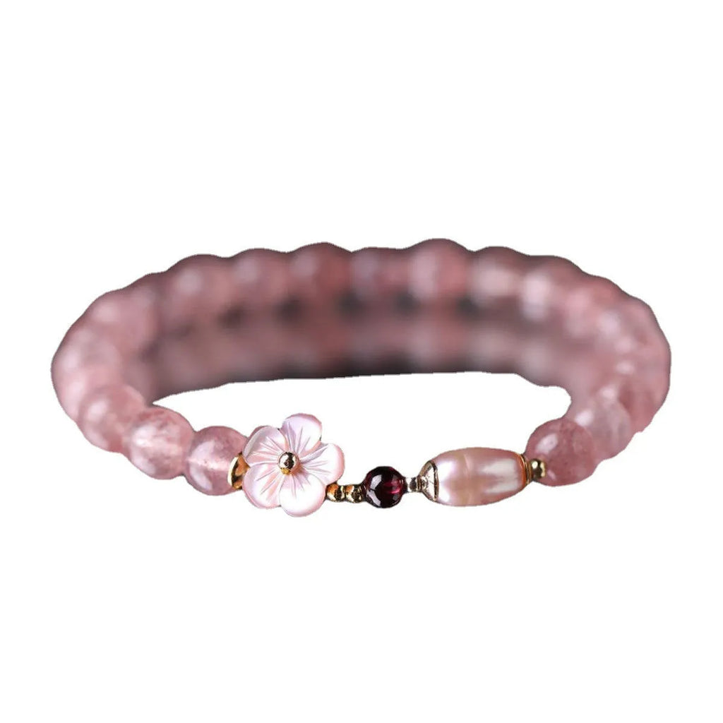 Strawberry quartz peach blossom bracelet with crystal flower design and adjustable fastening