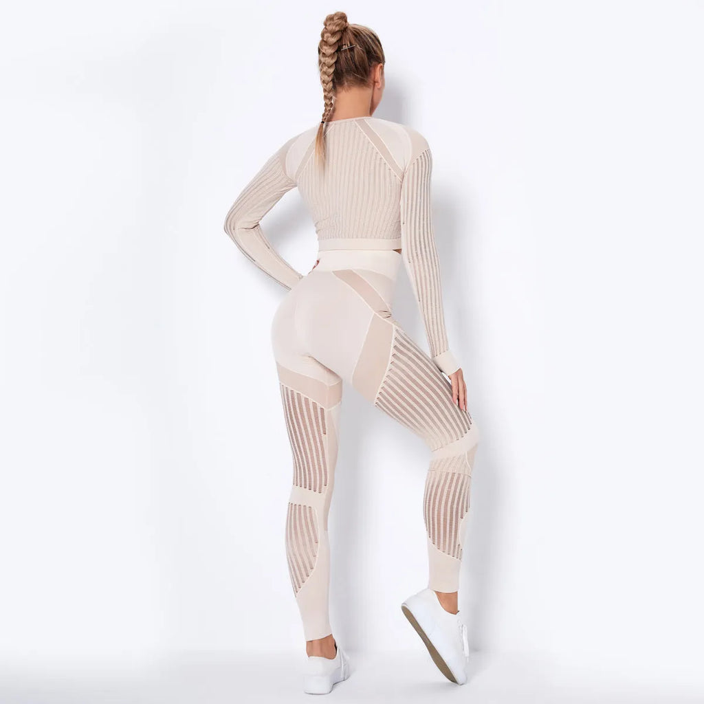 Women's seamless knitted long sleeve yoga wearsuit in a striped pattern, shown in a neutral colour.