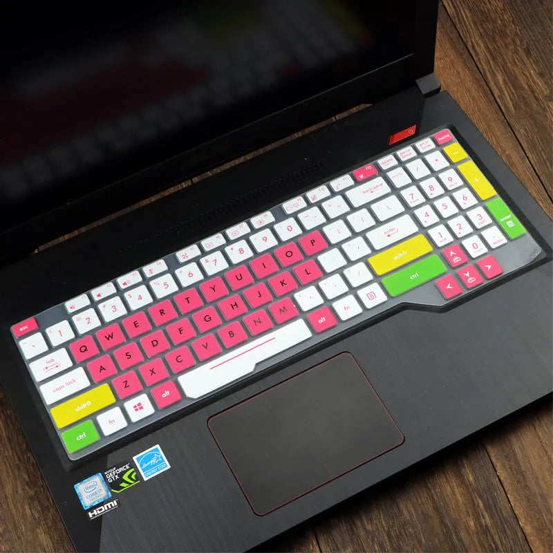 ASUS VivoBook 15 X513 laptop with a translucent mint coloured silicone keyboard protector fitted.