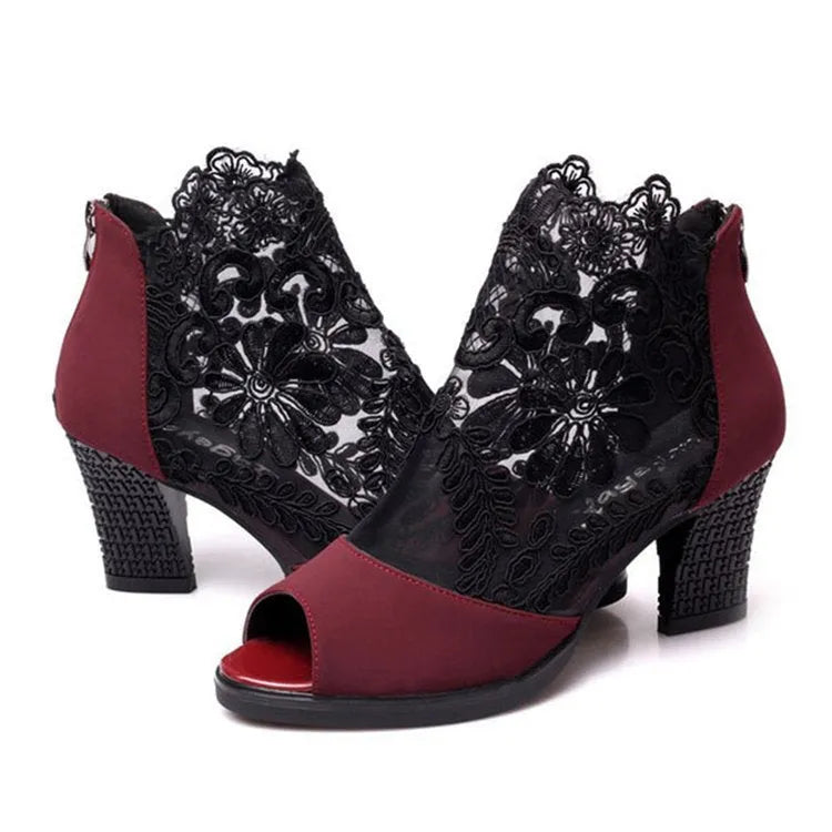 Black lace gladiator sandals with square high heel, peep toe and front zip closure