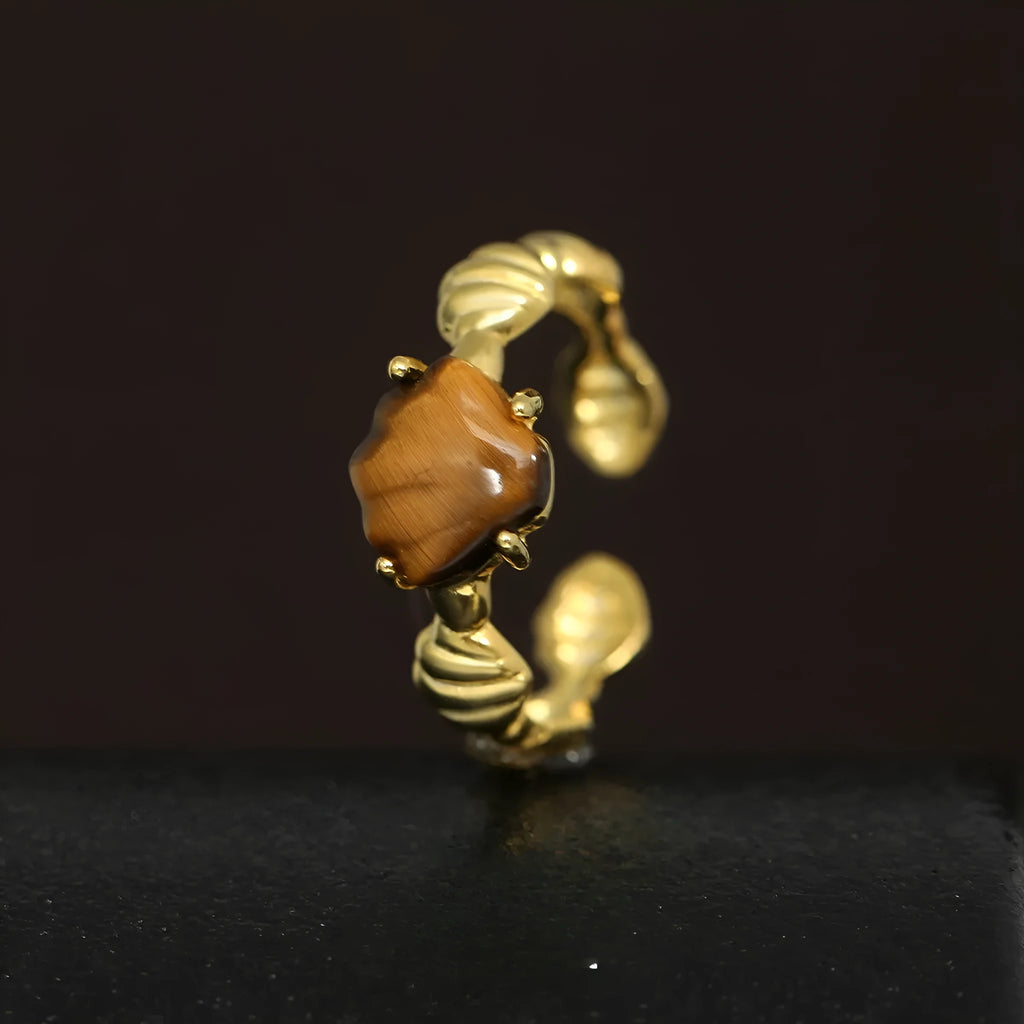 Adjustable silver ring with shell design and tiger eye stone in white gold plating