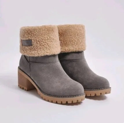 Women's suede mid-calf snow boot in grey with a flat heel and round toe.