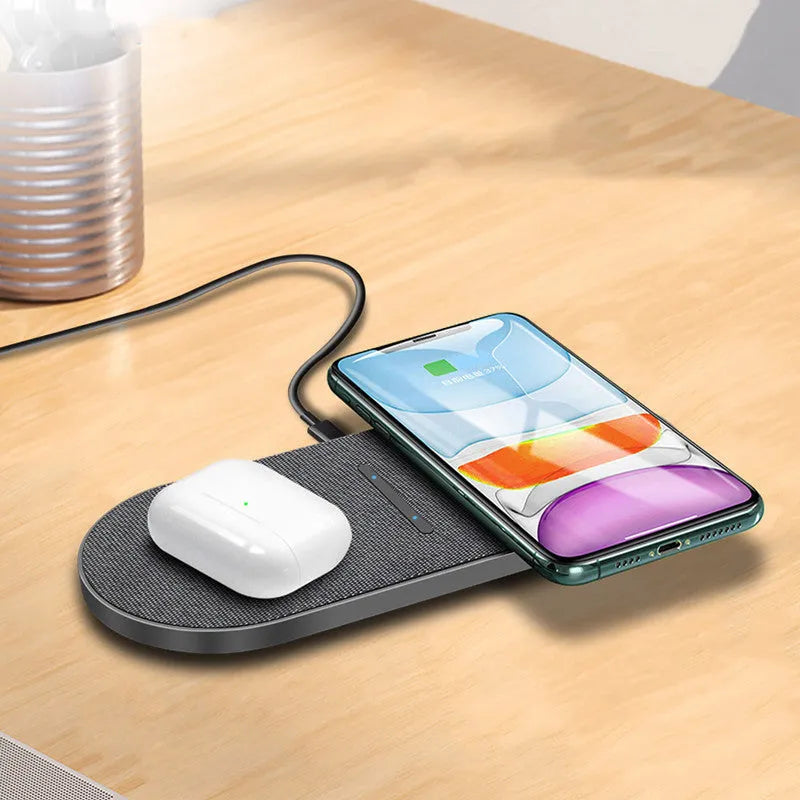 Black dual wireless charging pad for two phones with LED indicators