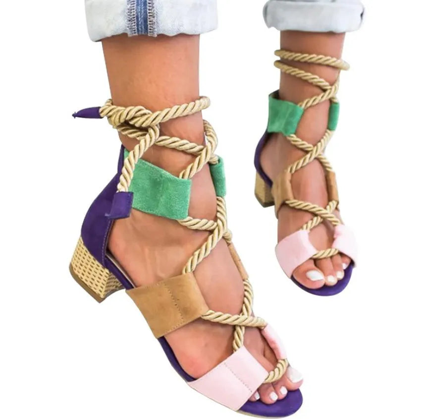 Women's beige suede sandals with fish mouth toe, thick heel, and front ankle strap.