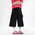 Retro denim workwear shorts with multiple pockets in wide-leg cropped fit
