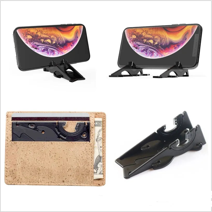 Black plastic card-type mobile phone holder on a desktop