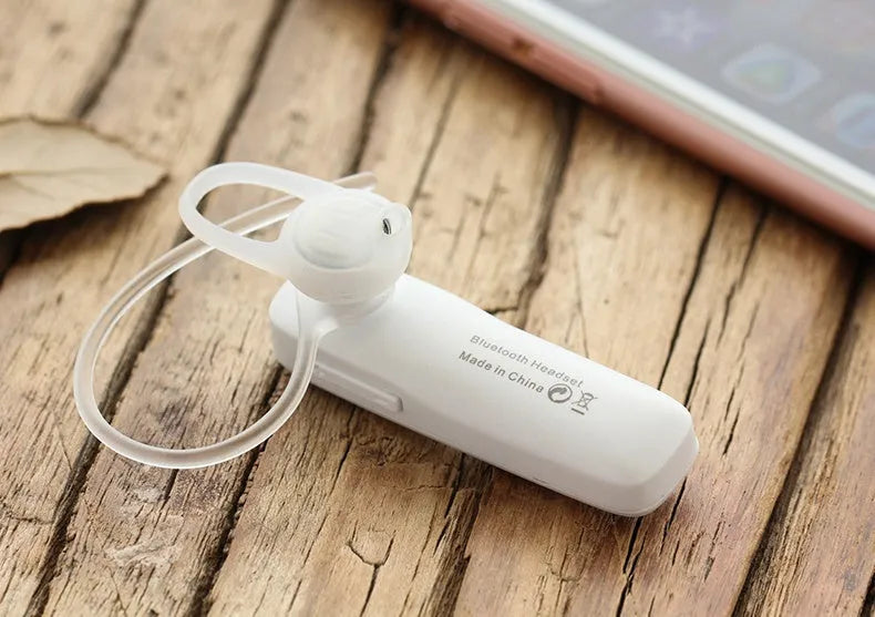 M165 wireless Bluetooth headset in black with hang-on ear design showing battery display