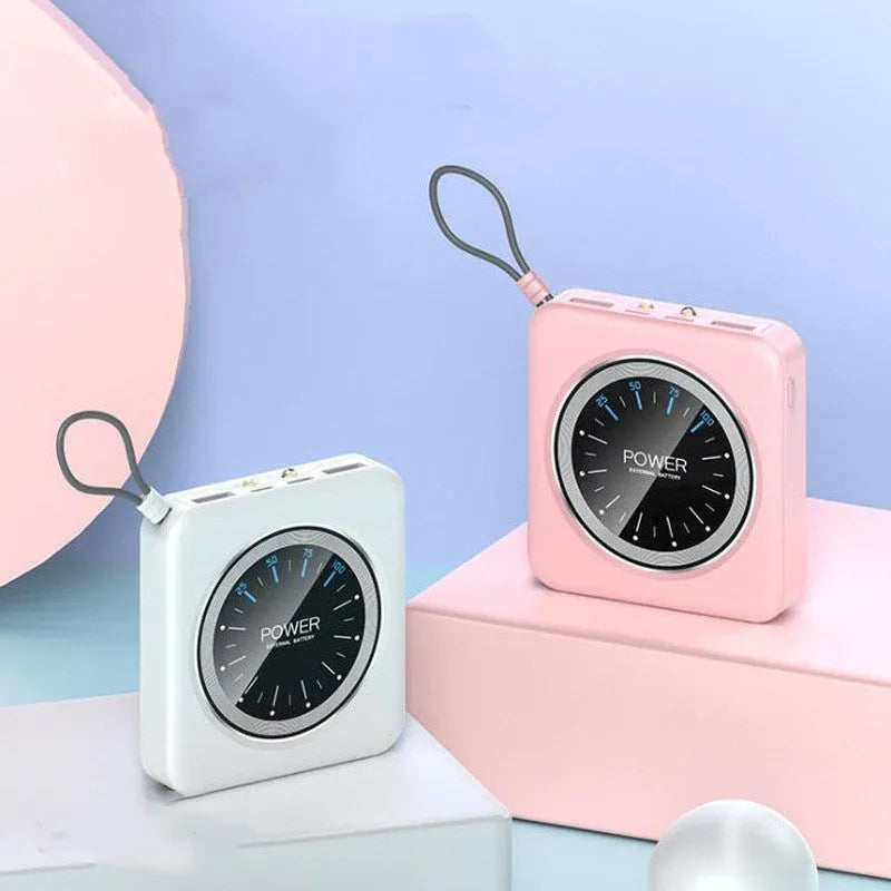 Mini clock charger power bank with LCD screen in mint green colour showing the time.