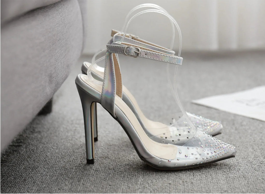 Women's pointed toe PVC sandals with diamond detail and a stiletto heel, shown in available sizes.