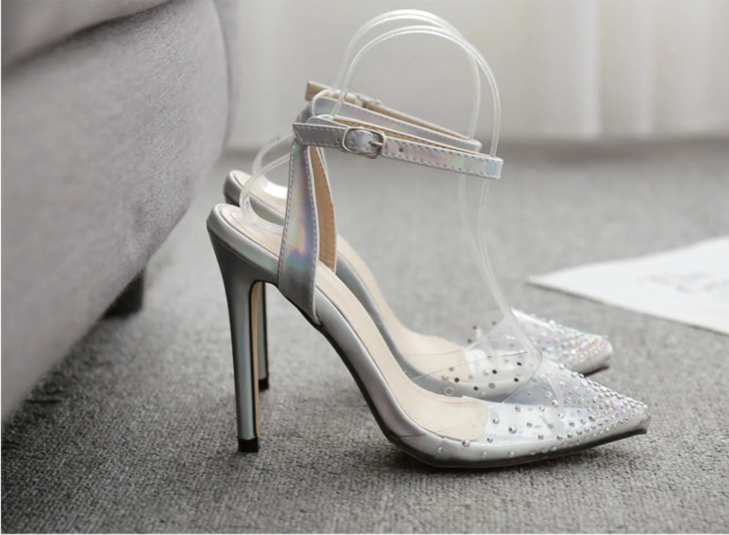 Women's pointed toe PVC sandals with diamond detail and a stiletto heel, shown in available sizes.