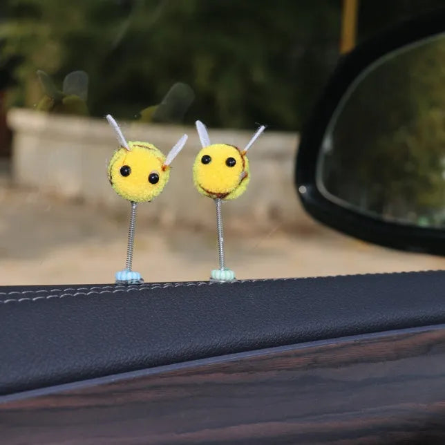 Square fur ball cartoon bee car decoration with black and yellow colours