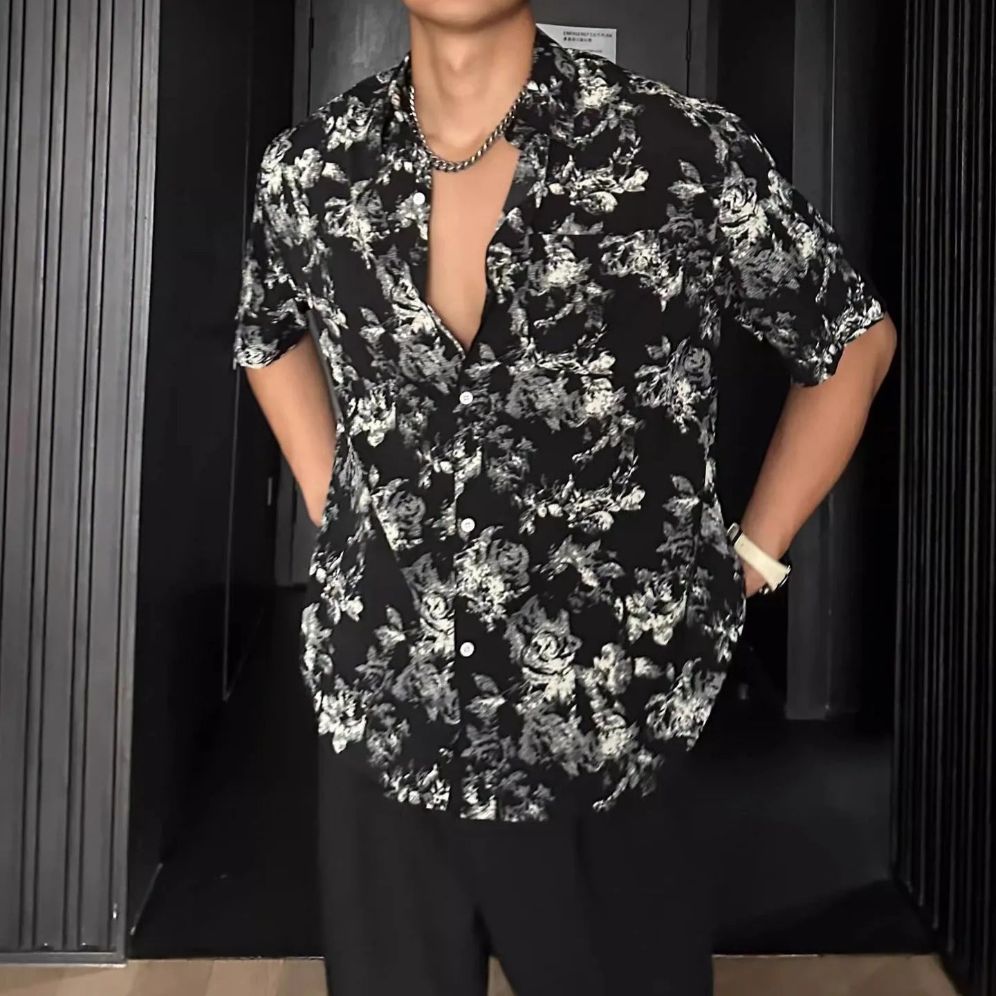 Loose fit floral printed short sleeve shirt in white or black with pendant-style front