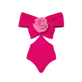 Women's floral hollow out one-piece swimsuit with matching cover-up skirt on a mannequin.