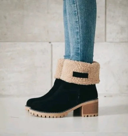 Women's suede mid-calf snow boot in grey with a flat heel and round toe.