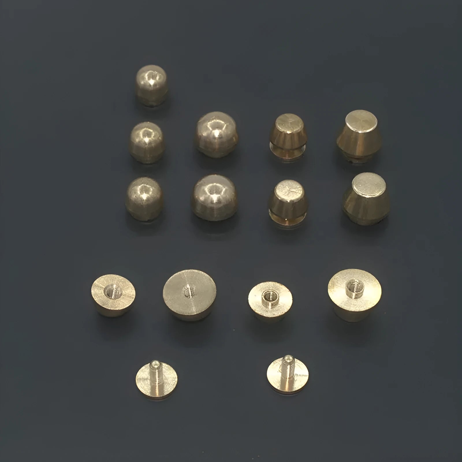 Brass decorative buckles in round and geometric shapes, sizes 10x6mm and 12x7mm.