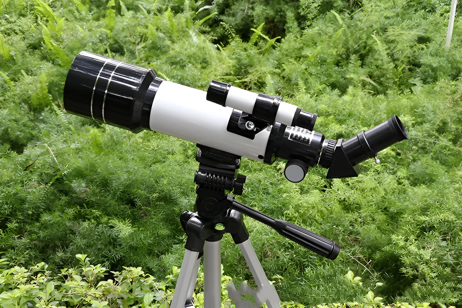 Dark blue children's astronomical telescope on tripod with 16X-66X magnification and mobile phone mount accessory
