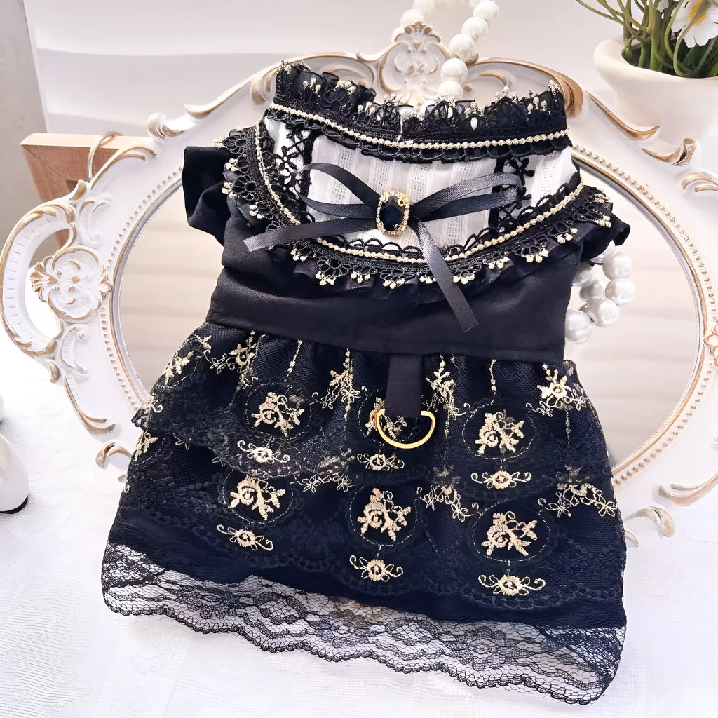 Golden gothic-style skirt costume for a small dog or cat on a mannequin.