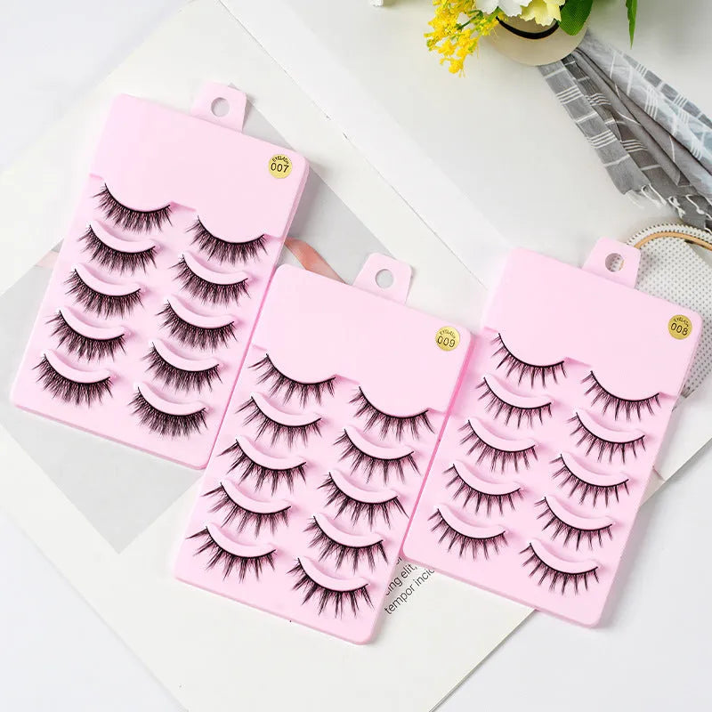 Set of three styles of black manga false eyelashes on plastic packaging