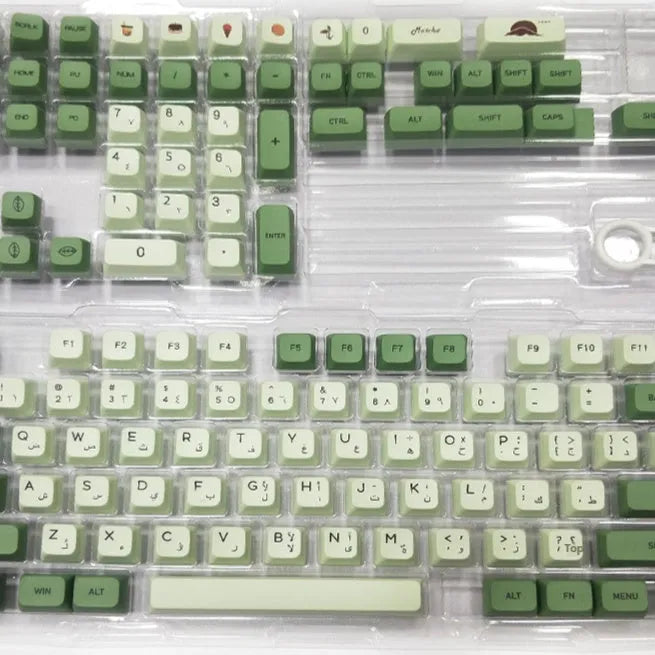 Full set of 124 matcha green PBT keycaps for a mechanical keyboard, showing various international layout options.