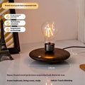 Suspension bulb creative night lamp with iron art construction on black wood grain desktop base