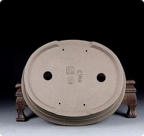 Handmade purple sand ceramic antique oval bonsai flower pot measuring 25x21x6.3cm