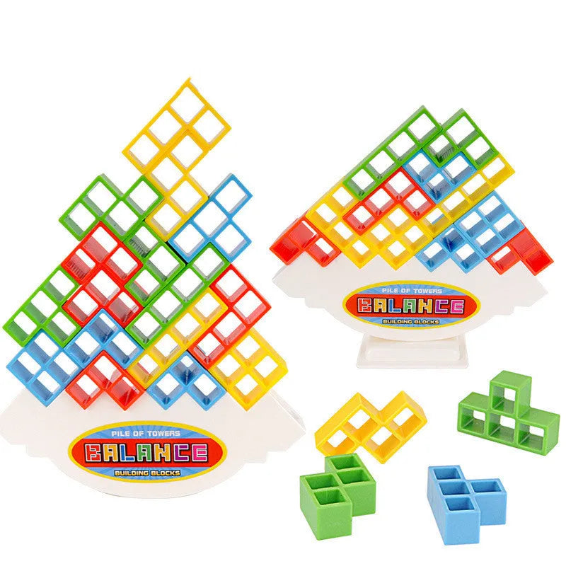 Plastic balance stacking board game with 16 colourful building blocks, a chassis, and a base on a flat surface.