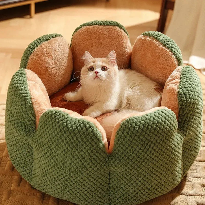 Green cactus-shaped enclosed pet kennel with soft plush interior, shown on a hardwood floor.
