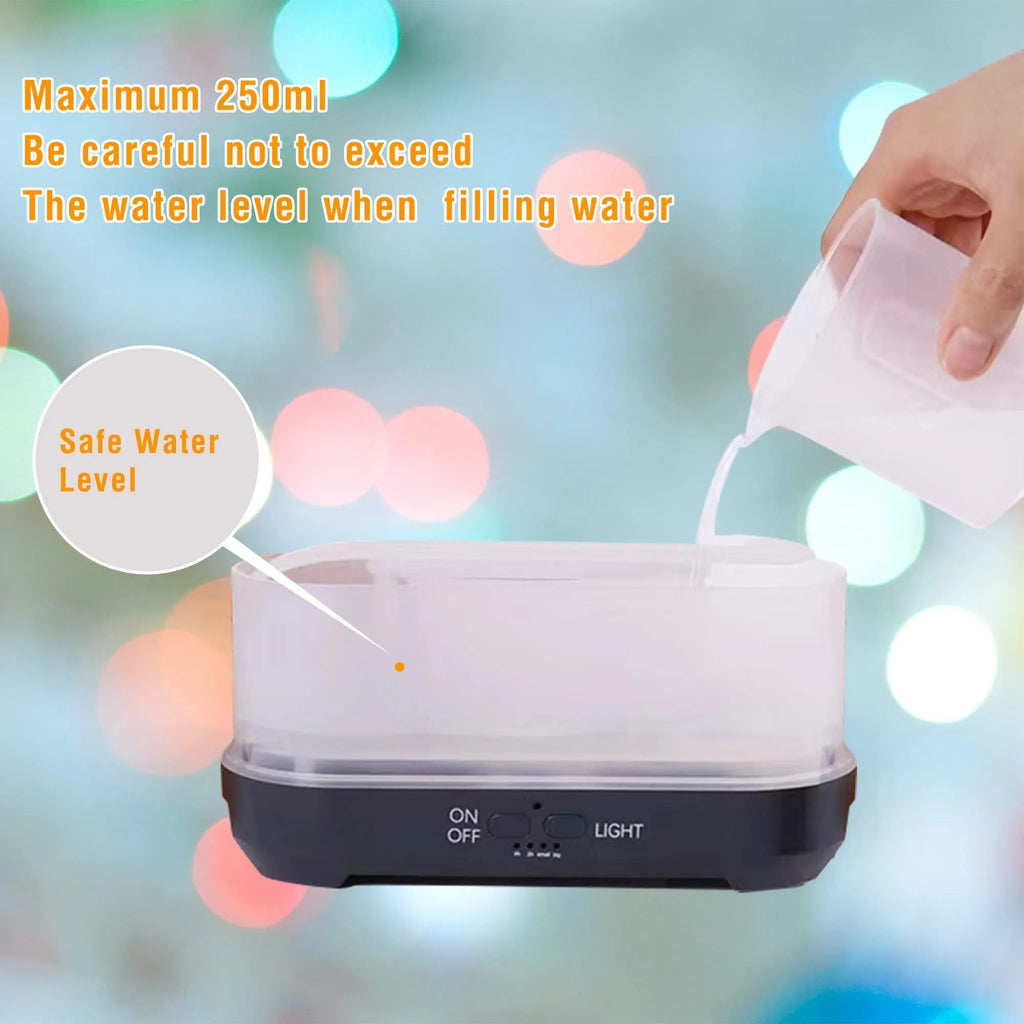 Colourful snowflake wood grain flame effect aromatherapy humidifier diffuser on a desktop with remote control.