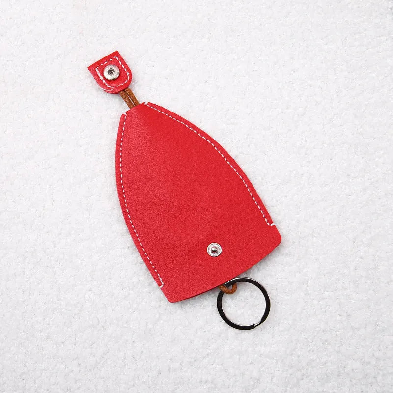 Cartoon style pull-out car key case made from PU leather in assorted designs