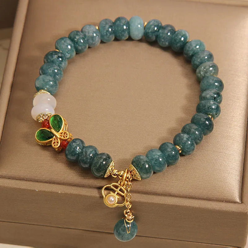 Women's blue water jade abacus bead bracelet with alloy inlay and butterfly charms