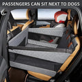 Grey waterproof cloth dog bed measuring 56cm with raised cushion design for indoor floor use