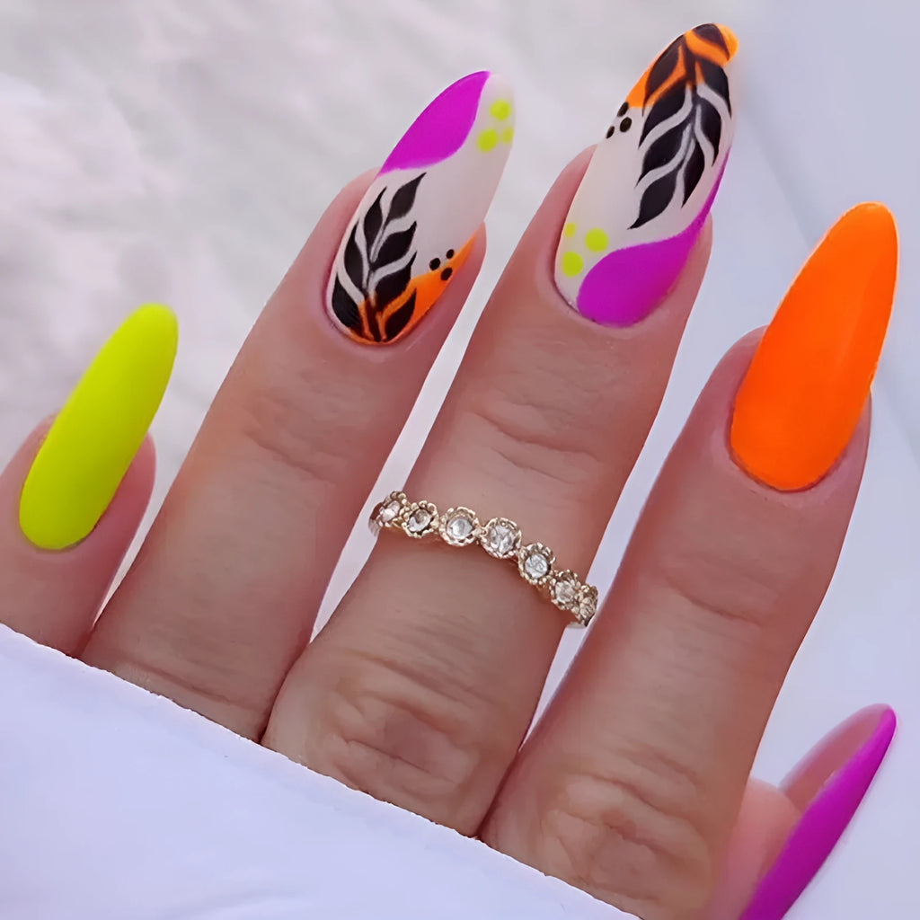 Wear Armour frosted finish almond nail stickers set showing four designs: French leaves, colourful plating, star macaron, and leopard print.