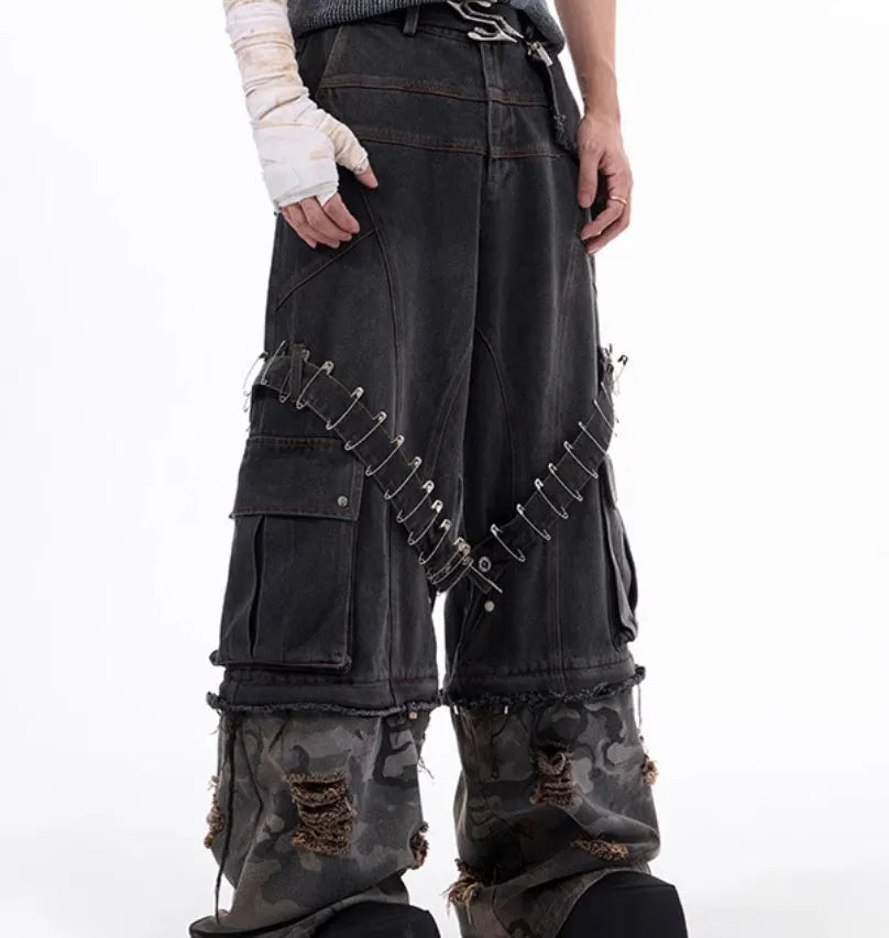 Grey men's jeans with camouflage pattern and ribbon splicing details on cotton denim.