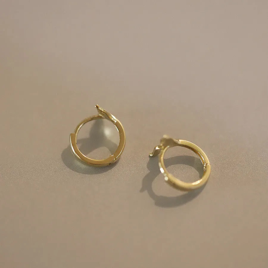 S925 sterling silver fishtail earrings with gold plating showing 8mm inner diameter