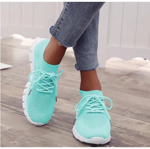 Women's breathable high-top lace-up casual sneakers in black with rubber sole and flat heel