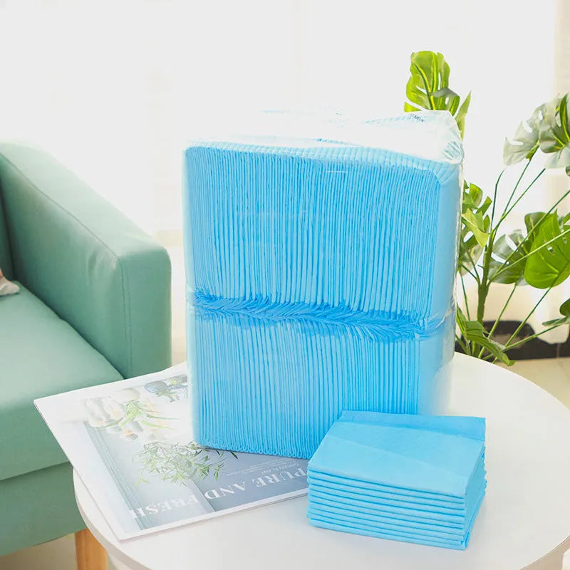 Pack of pet urinal pads showing different sizes and bamboo charcoal, economy, thickened model options.