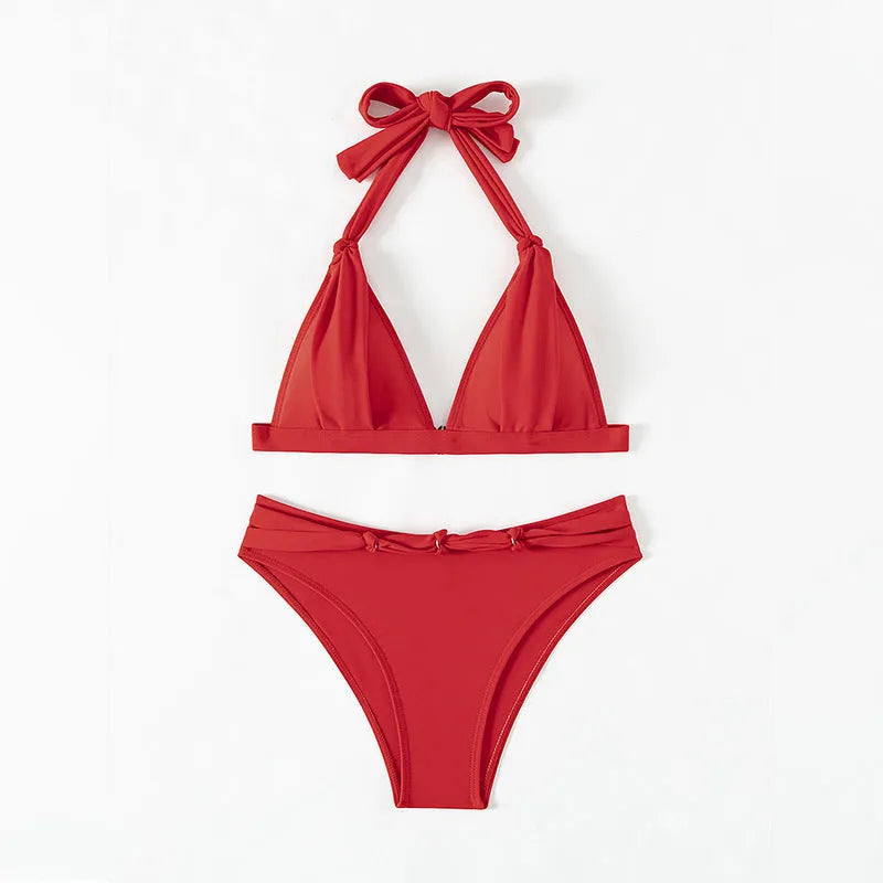 Red women's bikini with lace-up halterneck and split shorts