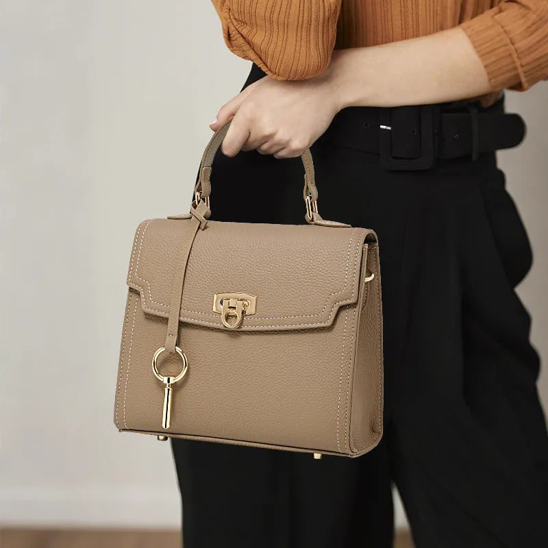 Elephant grey vintage handbag with litchi pattern leather and lock clasp